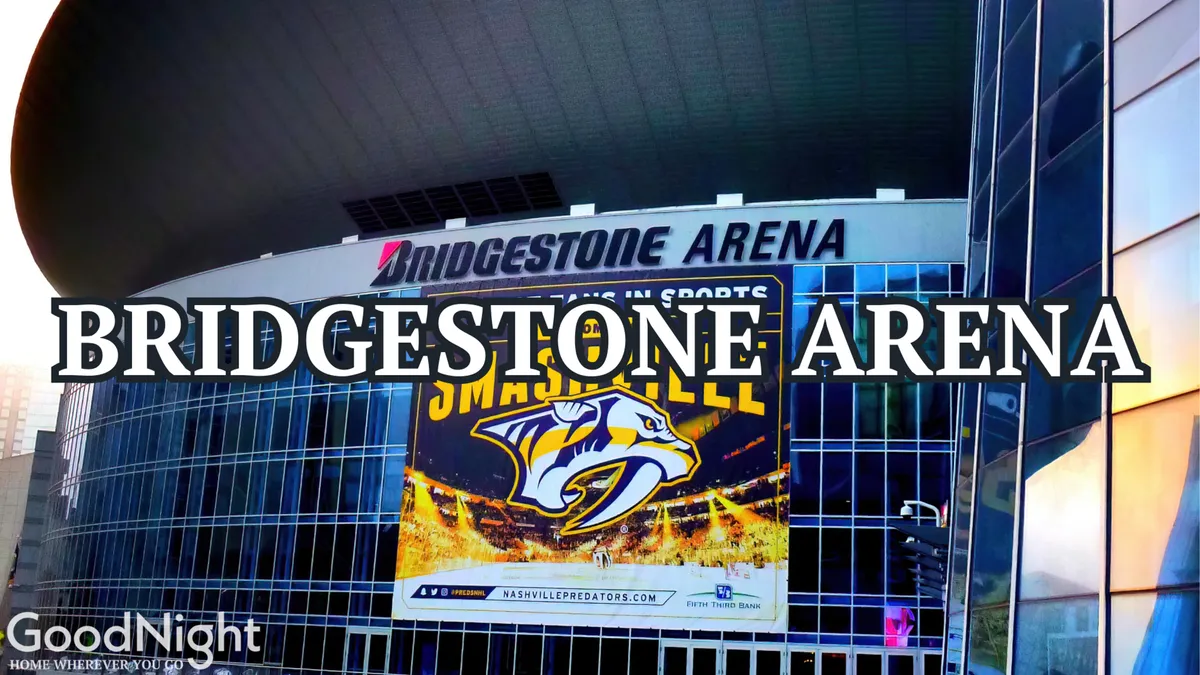 The exterior of Bridgestone Arena, featuring prominent signage, a Nashville Predators banner, and sleek, modern architecture. The arena is a hub for sports, live music, and major events at the heart of downtown.